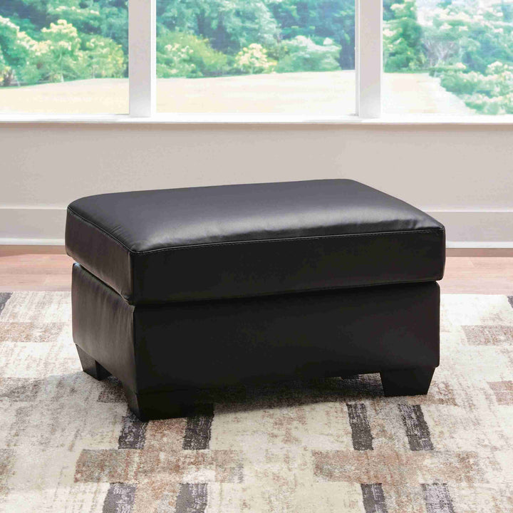 PC6980414 Glennbre Accent Ottoman In Leatherette Upholstery - Midnight | Signature Design By Ashley