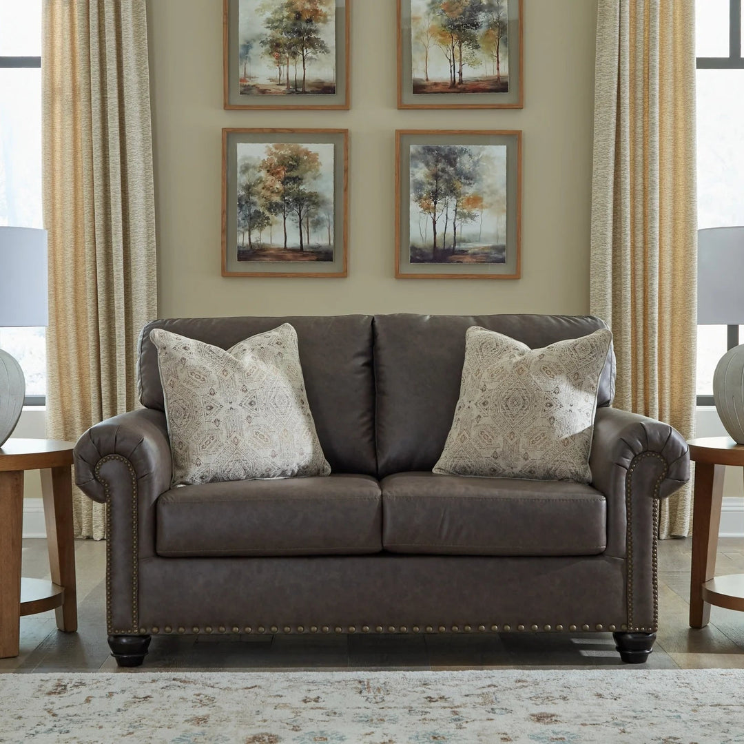 5550335 Roxmere Loveseat In Faux Leather Upholstery - Umber | Benchcraft By Ashley