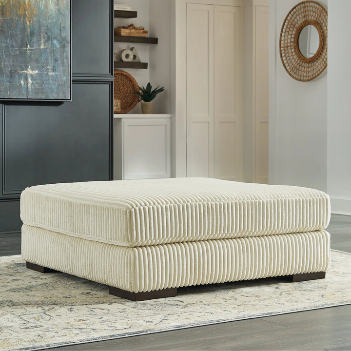 2110408 Lindyn Oversized Accent Ottoman In Fabric Upholstery - Ivory | Signature Design By Ashley