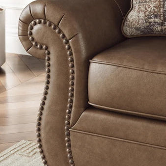 PC5590238 Chasemore Stationary Sofa In Faux Leather Upholstery - Earth | Signature Design By Ashley