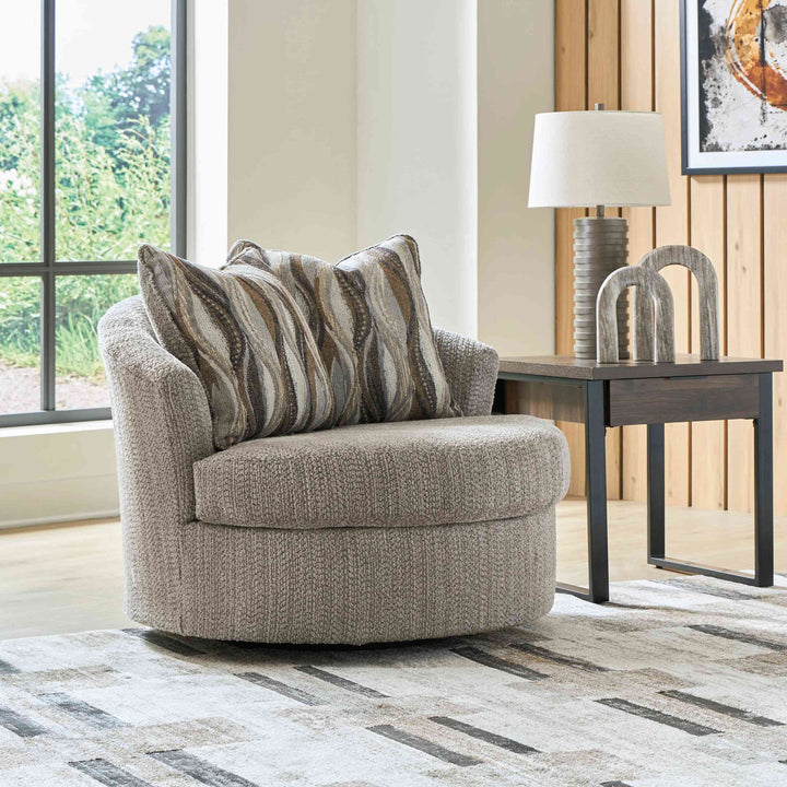 PC6960444 Lofwood Swivel Accent Chair In Fabric Upholstery - Fossil | Signature Design By Ashley