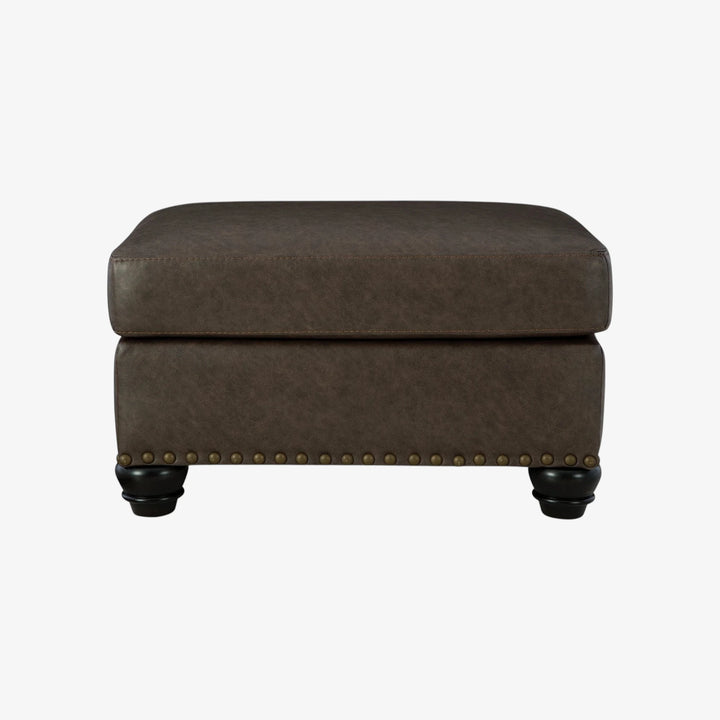 5550314 Roxmere Accent Ottoman In Faux Leather Upholstery - Umber | Benchcraft By Ashley