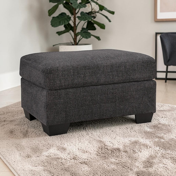 6310114 Loreo Accent Ottoman In Fabric Upholstery - Ebony | Benchcraft By Ashley