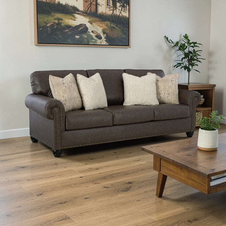 5550338 Roxmere Sofa In Faux Leather Upholstery - Umber | Benchcraft By Ashley